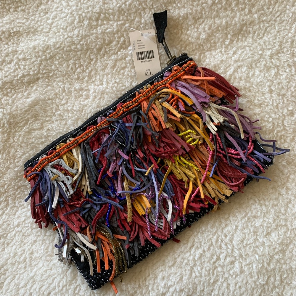 A perfect summer clutch : leather fringe, iridescent & jewel-toned beads, oh my!